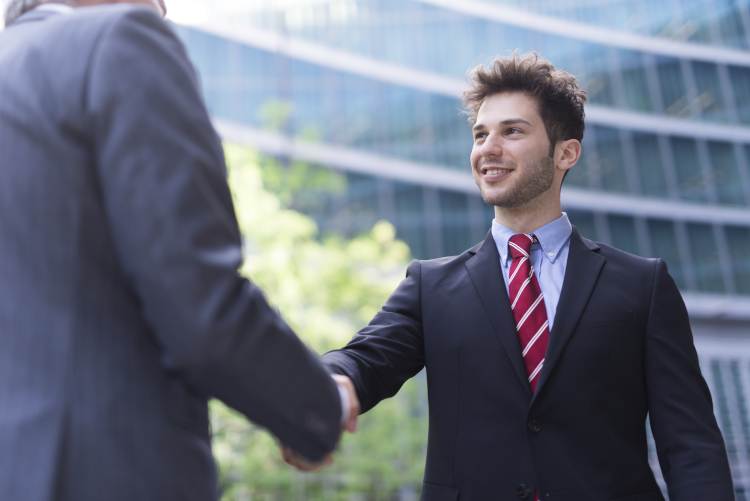young-person-shaking-hands